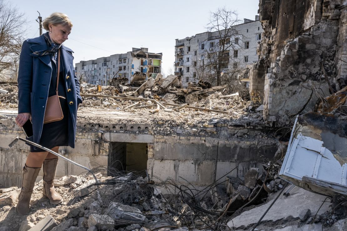 Rep. Victoria Spartz surveys damage to buildings in Bucha, Ukraine, on April 14, 2022. (Daniel Berehulak/The New York Times)