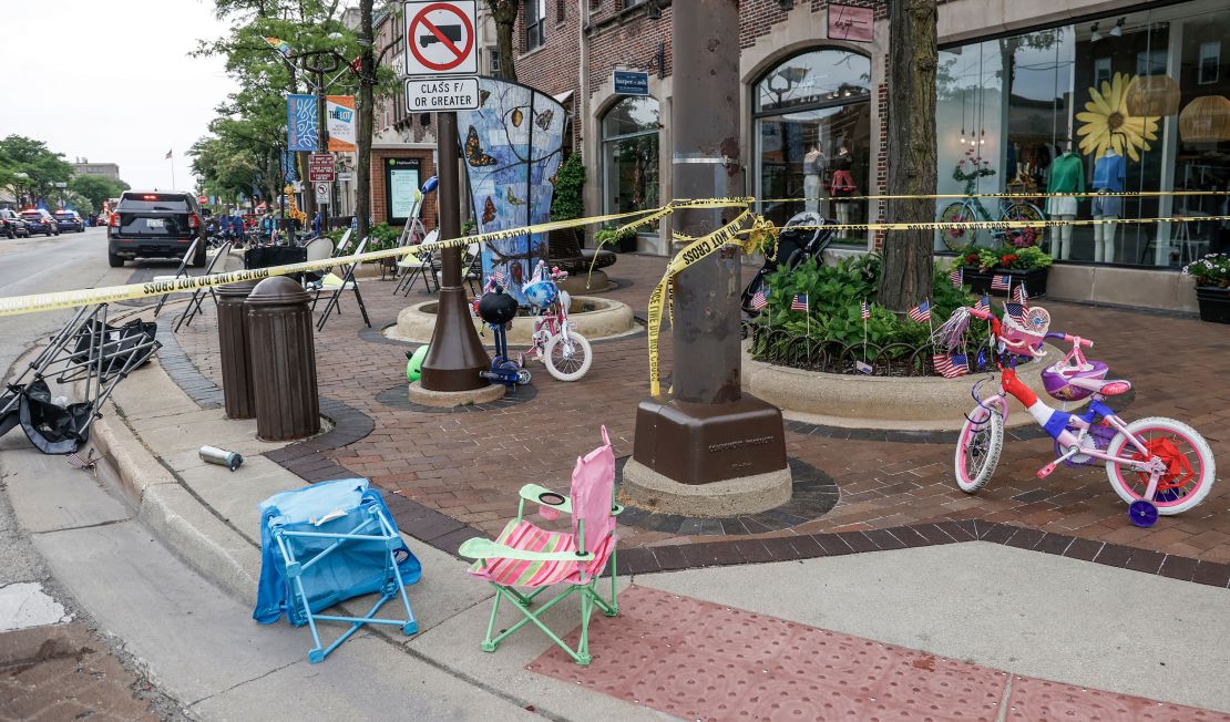 Chairs and bycycles lie abandoned after people fled the scene of a mass shooting at a 4th of July celebration and parade in Highland Park, Illinois.