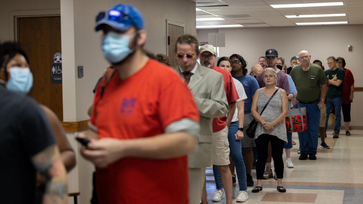 Voters wait in line at the Covenant Presbyterian Church in Wichita, Kansas on August 2, 2022. 