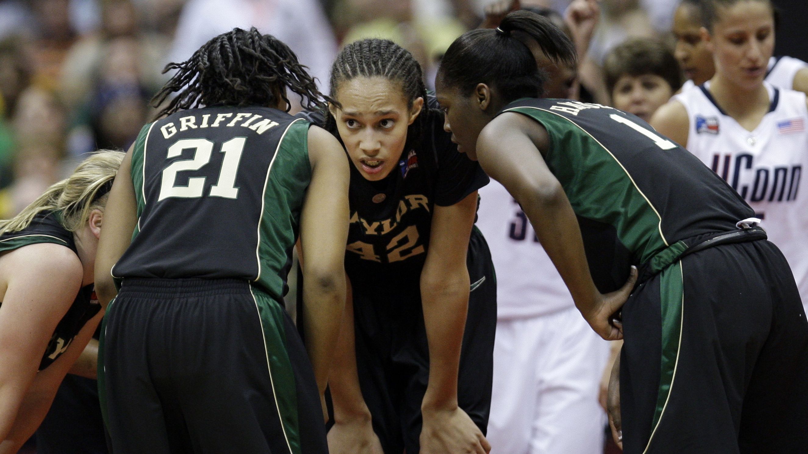 Griner huddles with Baylor teammates during a Final Four game in 2010.