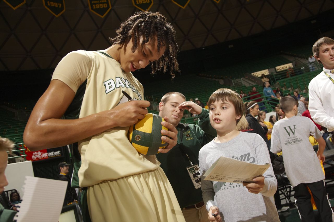 Griner #42 of Baylor University signs autographs after a game against Louisiana Tech.