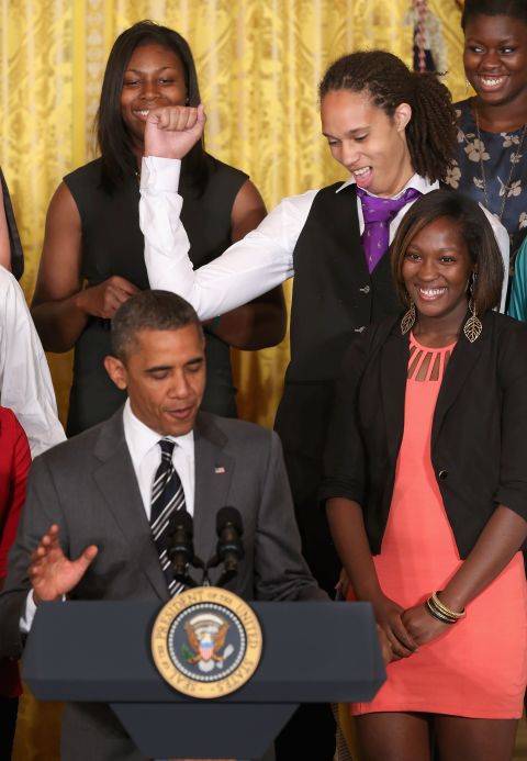 Griner pumps her fist as President Barack Obama talks about her basketball skills in the East Room of the White House in July 2012.