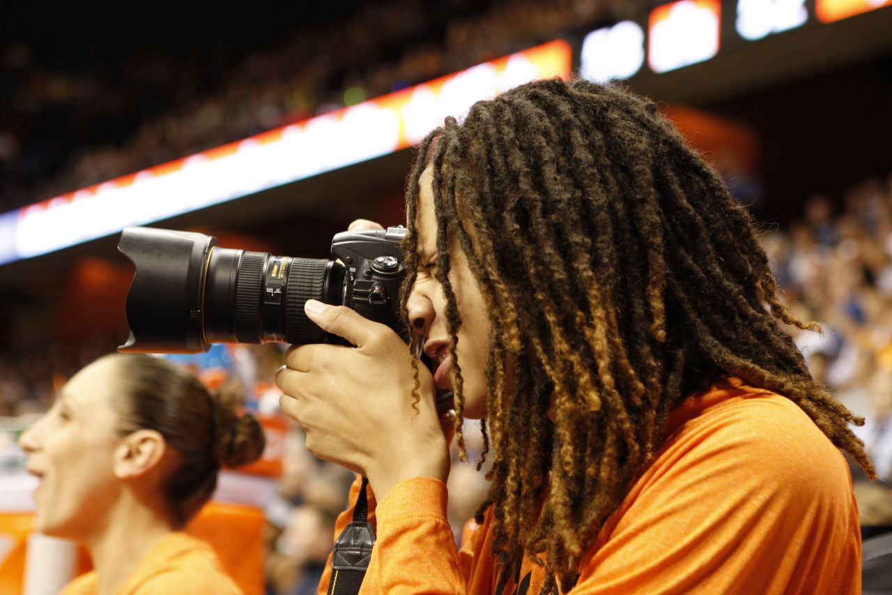 Griner takes a photo during the 2013 WNBA All-Star Game at Mohegan Sun Arena in Uncasville, Connecticut. 