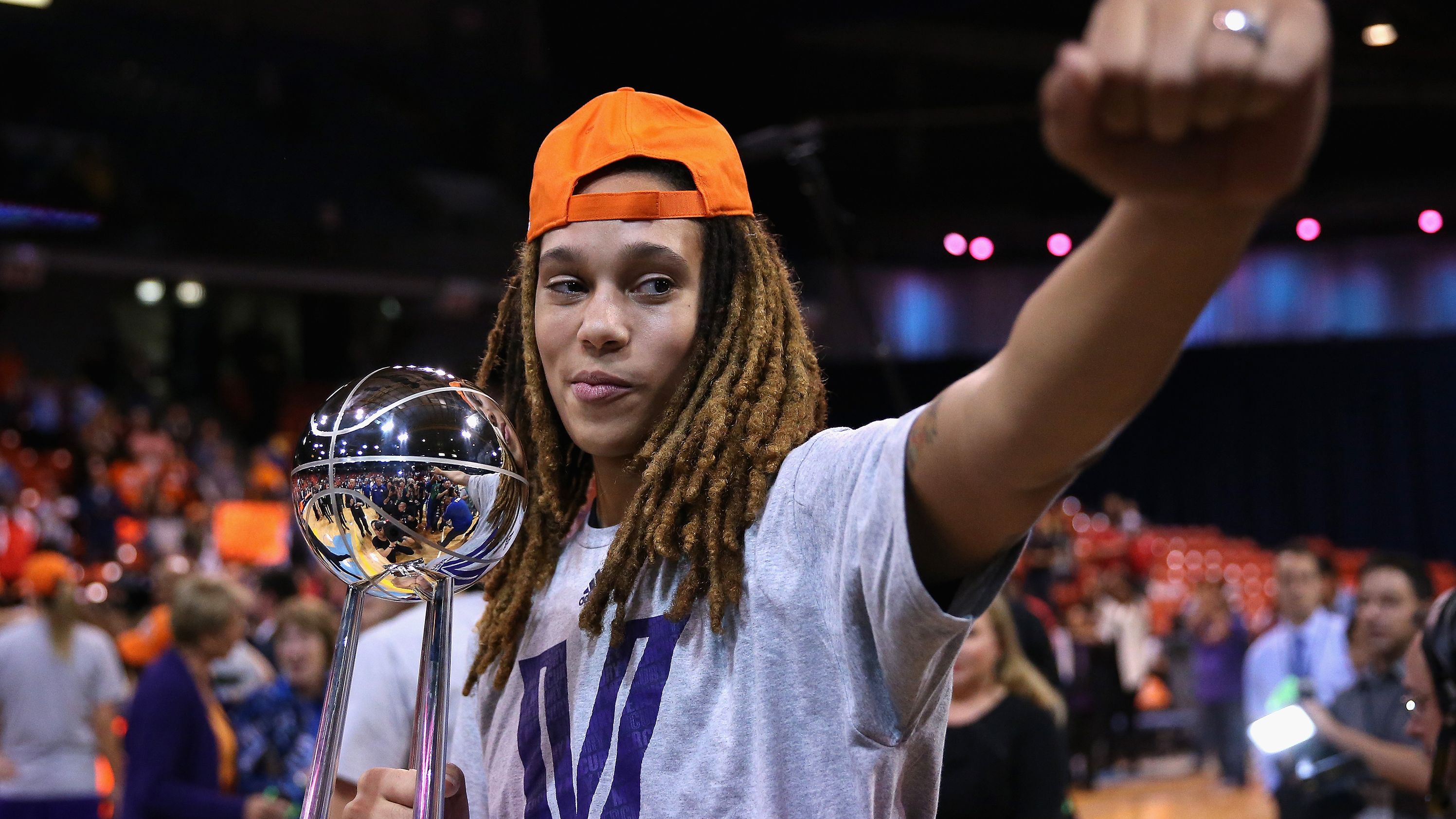 Griner holds the WNBA championship trophy after Phoenix defeated Chicago in 2014.