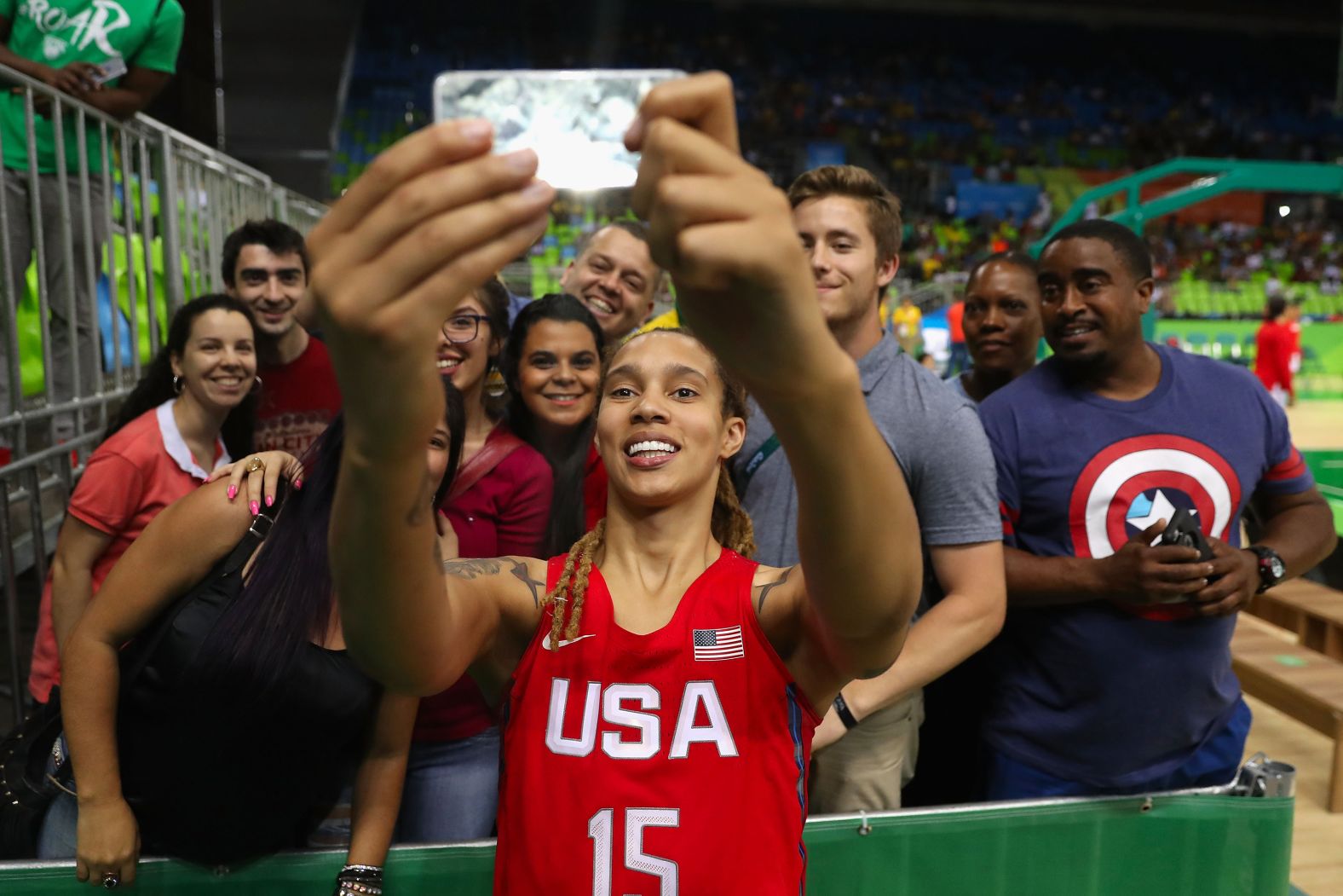 Griner poses for a selfie with fans in 2016.