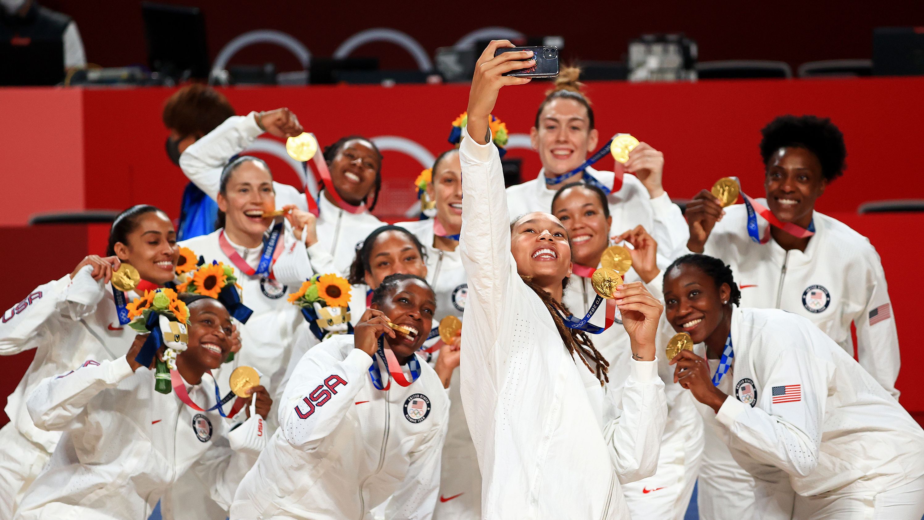 Griner takes a selfie with her teammates after they won Olympic gold in 2021.