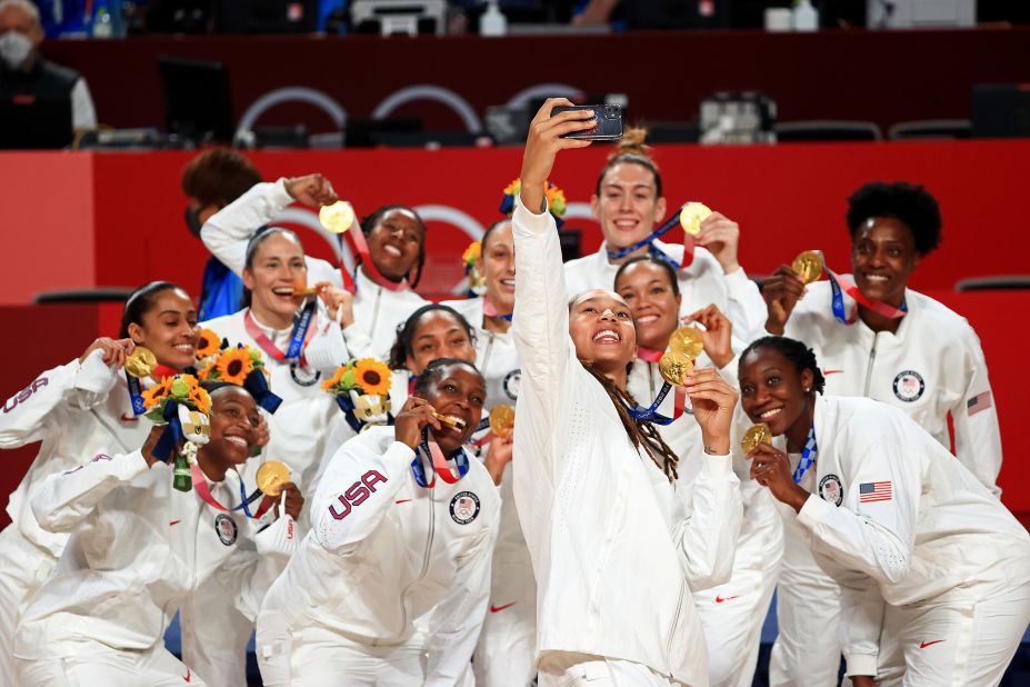 Griner takes a selfie with her teammates after they won Olympic gold in 2021.