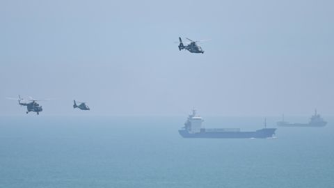 Chinese military helicopters fly past Pingtan island, one of mainland China's closest point from Taiwan on August 4, 2022.