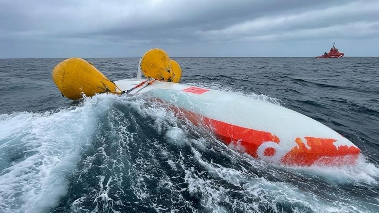 The man survived for 16 hours at sea by using an air bubble inside his boat after it capsized in the Atlantic Ocean.
