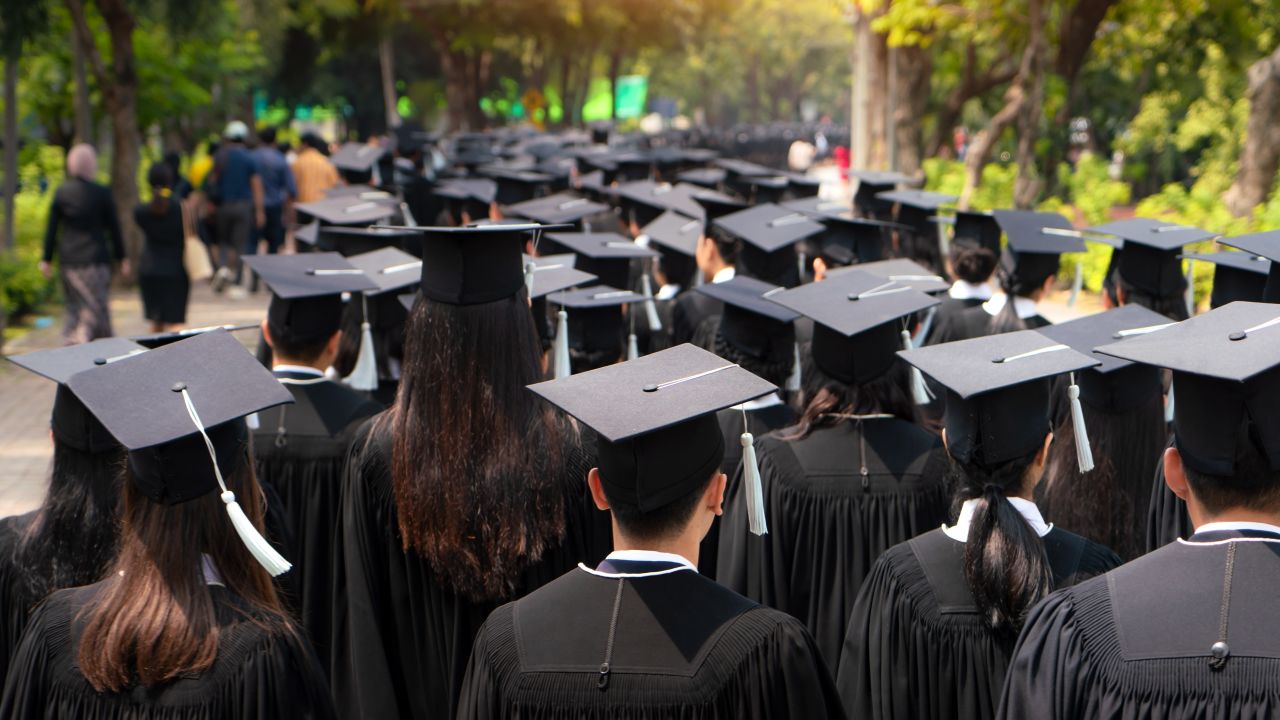 01 college graduates STOCK