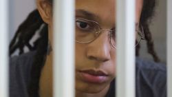 U.S. basketball player Brittney Griner, who was detained at Moscow's Sheremetyevo airport and later charged with illegal possession of cannabis, sits inside a defendants' cage before the court's verdict in Khimki outside Moscow, Russia August 4, 2022. REUTERS/Evgenia Novozhenina/Pool
