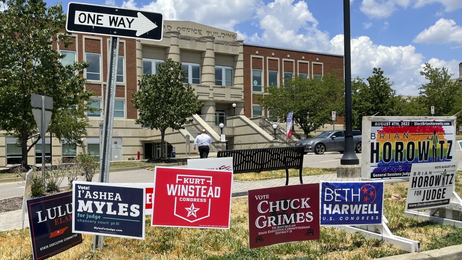 Campaign signs are posted outside a polling location on the first day of early voting July 15, 2022, in Nashville, Tennessee.