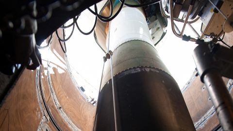 File photo of a Minuteman III missile booster being lowered into a launch facility at Vandenberg Air Force Base, California in 2015.