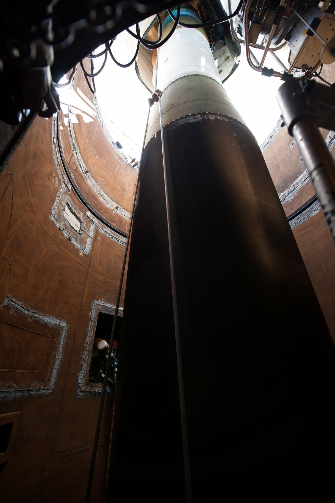 File photo of a Minuteman III missile booster being lowered into a launch facility at Vandenberg Air Force Base, California in 2015.