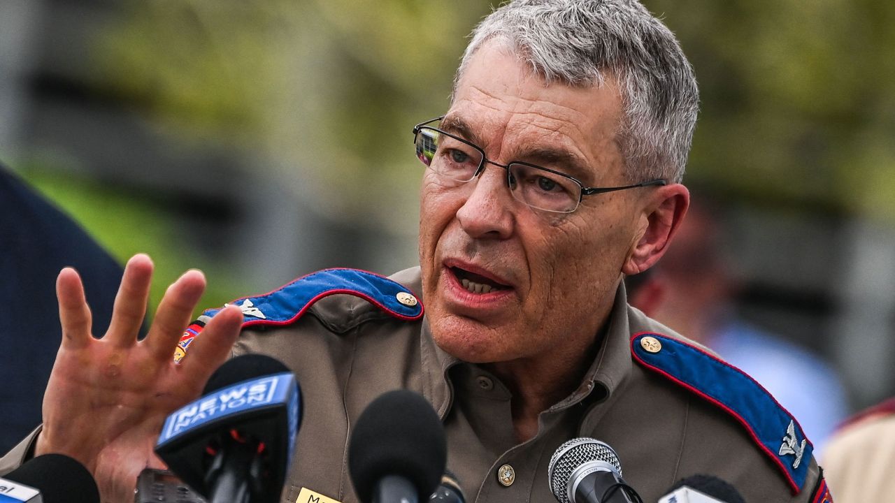 Col. Steven McCraw, photographed outside Robb Elementary School in May, pledged to meet with victims' families when he had enough answers for them.