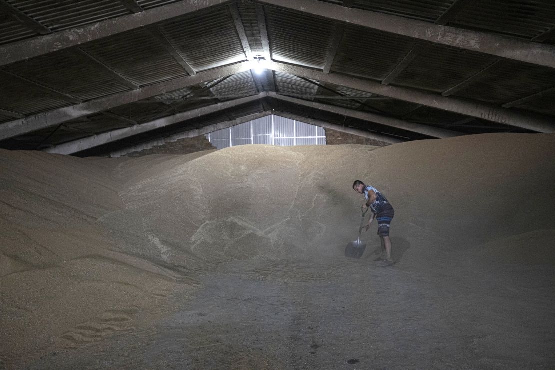 A Ukrainian farmer works at a warehouse in Odesa, southern Ukraine, in July.