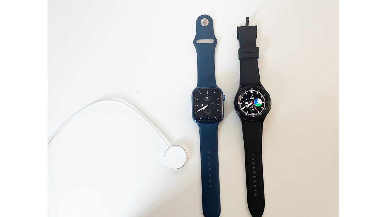 (left to right): The Apple Watch wireless charger, the Apple Watch and the Samsung Galaxy Watch we used during testing. For both smartwatches, you can choose all kinds of timekeeping faces and load numerous apps besides payment apps.