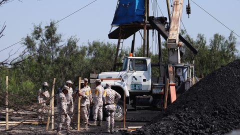 Mexican soldiers do rescue work at the coal mine.