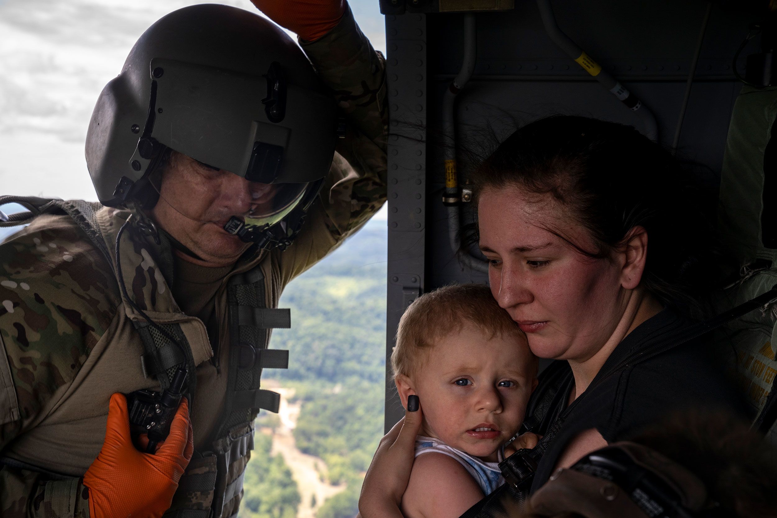 Tim Lewis of the Kentucky National Guard secures evacuees after flooding in Kentucky