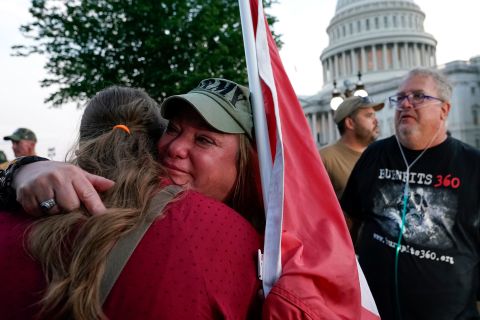 Kimberly Hughes, widow of US Army Reserve Maj. Gary Hughes, embraces a supporter on Capitol Hill on Tuesday, August 2, after the Senate voted to pass legislation <a href="https://www.cnn.com/2022/08/02/politics/senate-vote-burn-pits/index.html" target="_blank">expanding health care benefits for veterans</a> who were exposed to toxic burn pits during their military service.