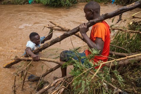 Volunteers search for flooding victims in Namakwekwe, Uganda, on Tuesday, August 2.<a href="https://www.cnn.com/2022/08/02/africa/uganda-floods-kill-24-intl/index.html" target="_blank"> Floods caused by torrential rains</a> have killed at least two dozen people in eastern Uganda.