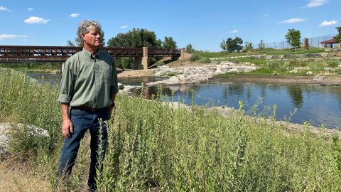 Kevin Rein, Colorado's state engineer and director of Colorado's division of Water Resources, by the South Platte River in the Denver metro area.