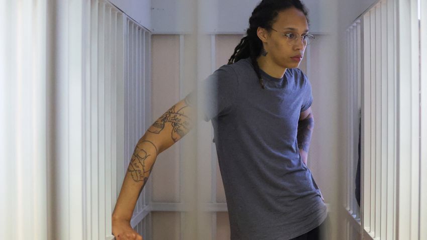 U.S. basketball player Brittney Griner, who was detained at Moscow's Sheremetyevo airport and later charged with illegal possession of cannabis, stands inside a defendants' cage before the court's verdict in Khimki outside Moscow, Russia August 4, 2022. REUTERS/Evgenia Novozhenina/Pool