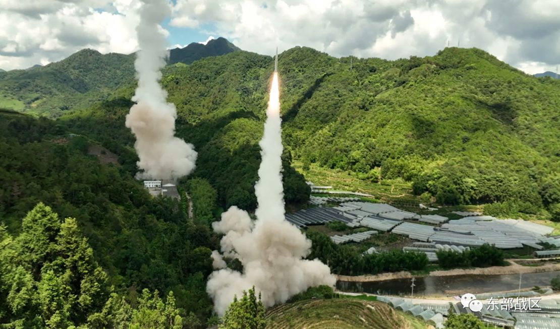 The rocket force of China's People's Liberation Army conducts missile tests into the waters off the eastern coast of Taiwan on August 4.