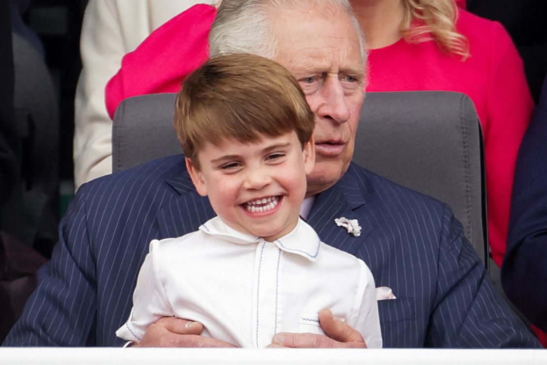 Prince Charles keeps Prince Louis entertained during the Platinum Pageant in London on June 5.