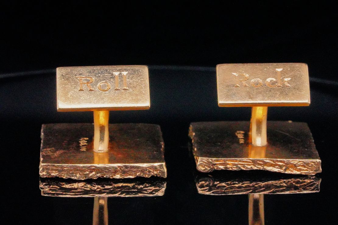 A pair of gold "Rock and Roll" cufflinks that the singer gifted to his long-time manager.