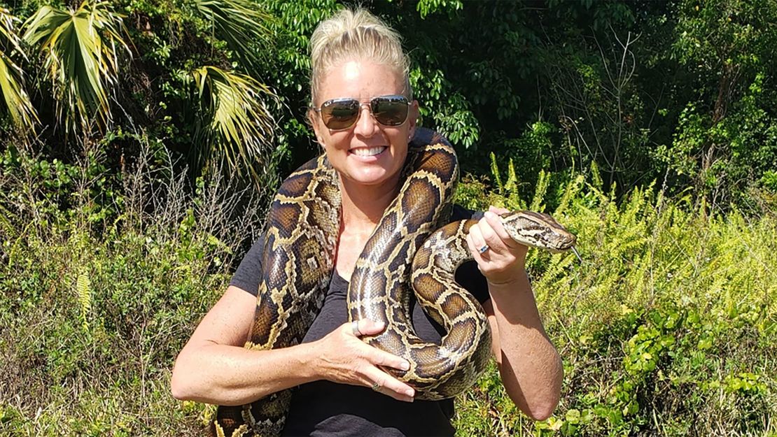 "I love snakes. I hate that we have to do this, but they're invasive and changing the entire ecosystem." Amy Siewe told CNN.