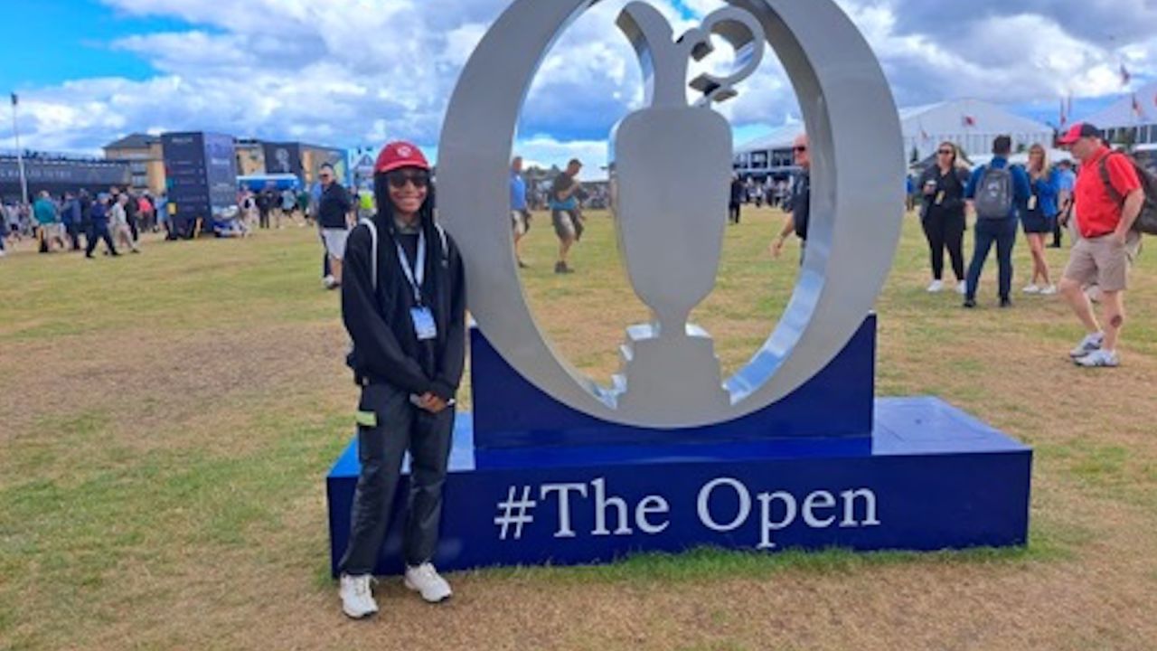 Essien attended the British Open to watch her role model, Tiger Woods, compete in the tournament.