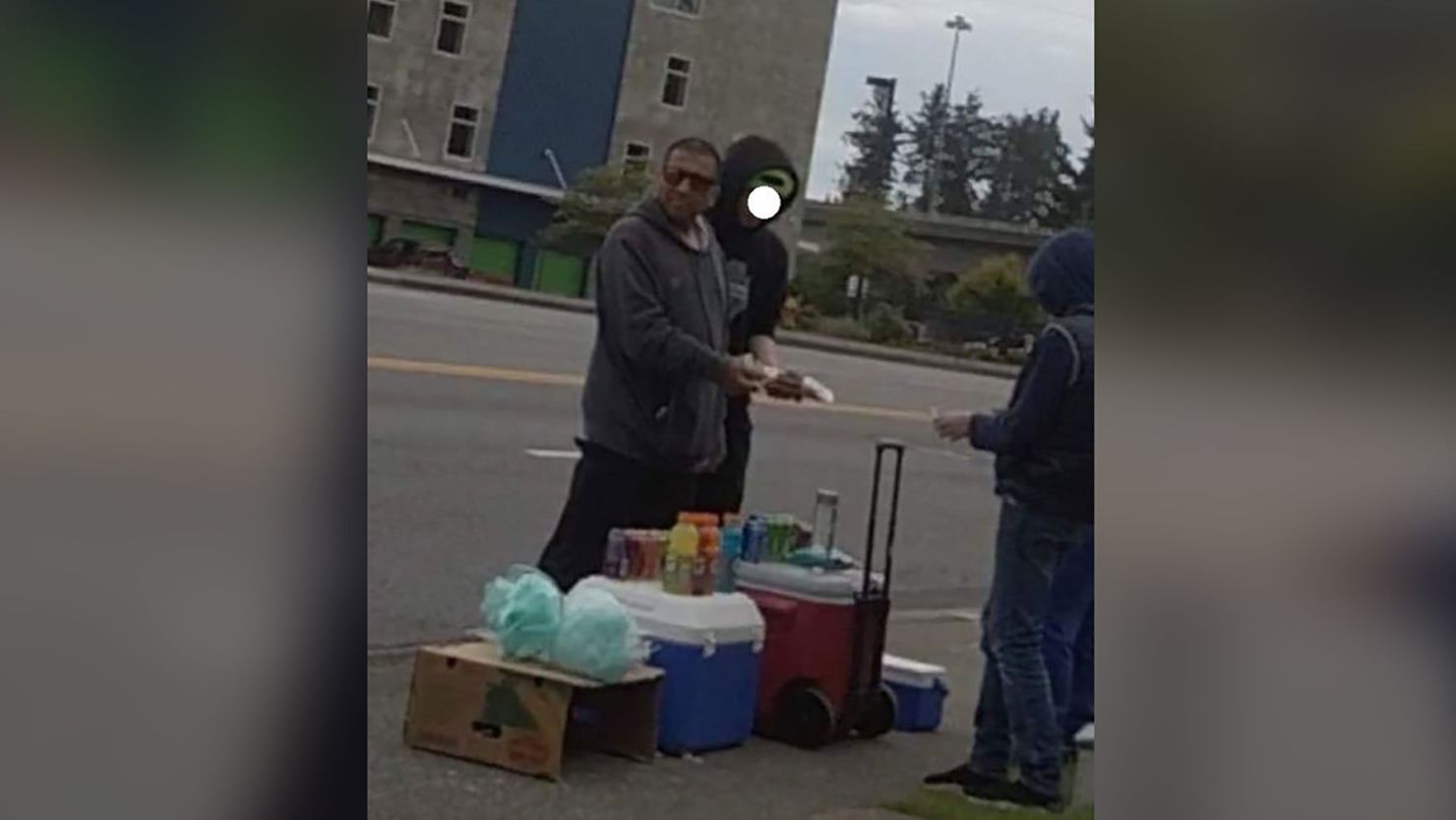 A man stiffed an 11-year-old boy with a fake $100 bill to buy lemonade from his stand. Everett Police has obscured a second individual in the photo. 