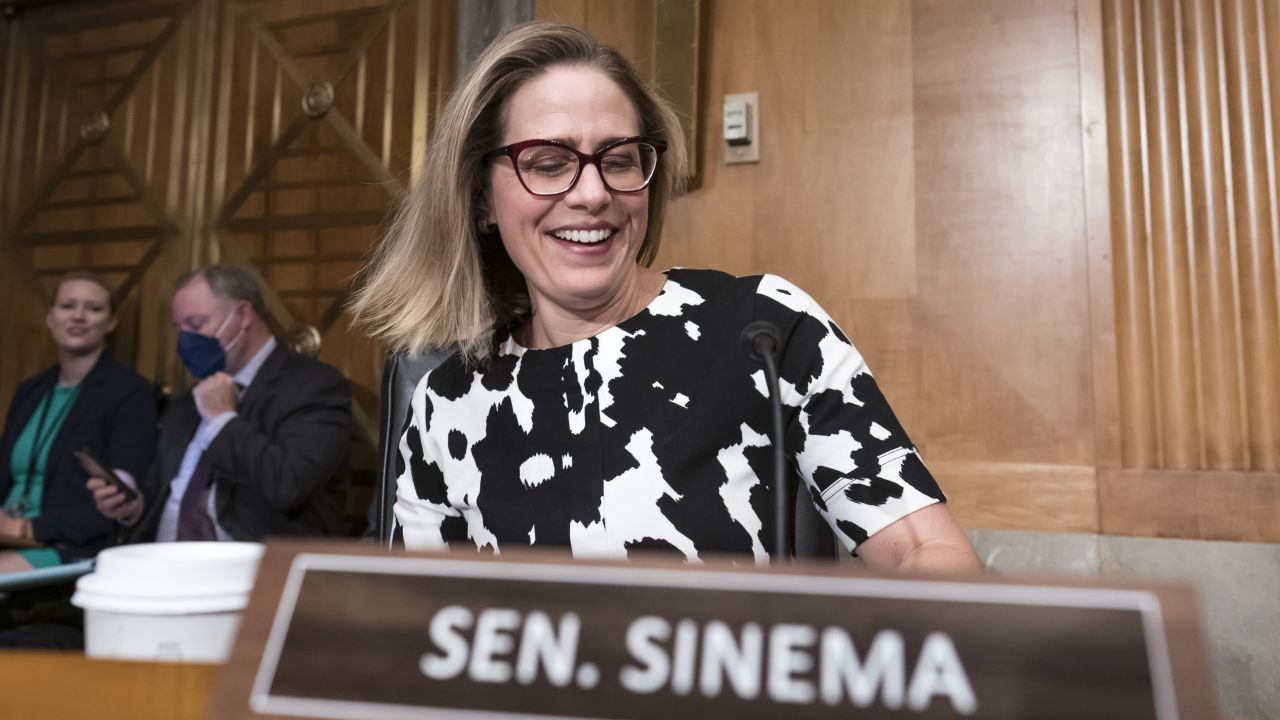 FILE - Sen. Kyrsten Sinema, D-Ariz., arrives for a meeting of the Senate Homeland Security Committee at the Capitol in Washington, Wednesday, Aug. 3, 2022. Sen. Joe Manchin sealed the deal reviving President Joe Biden's big economic, health care and climate bill. But it was Sinema who intently, quietly and deliberately shaped the final product. (AP Photo/J. Scott Applewhite, File)