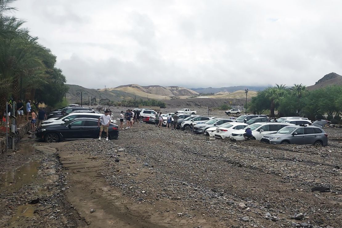 Approximately 60 cars belonging to visitors and staff at Death Valley National Park are buried under debris.