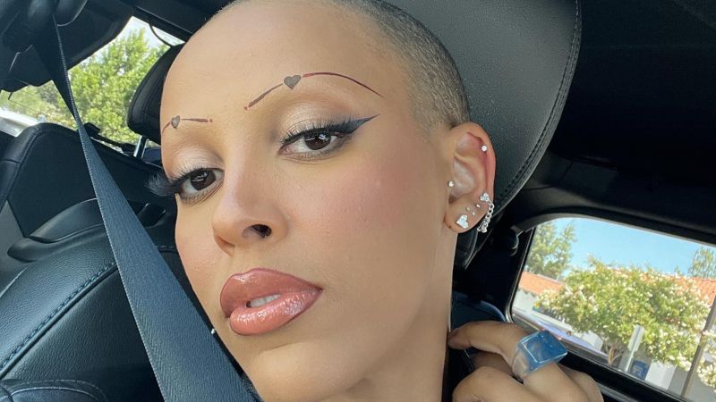 Doja Cat debuts new look after shaving her eyebrows on Instagram live | CNN