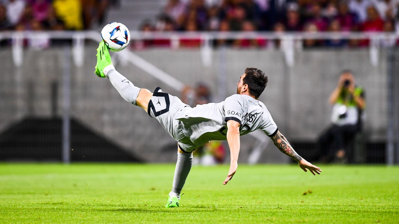 Lionel Messi scores his second goal of the game with an acrobatic effort. 
