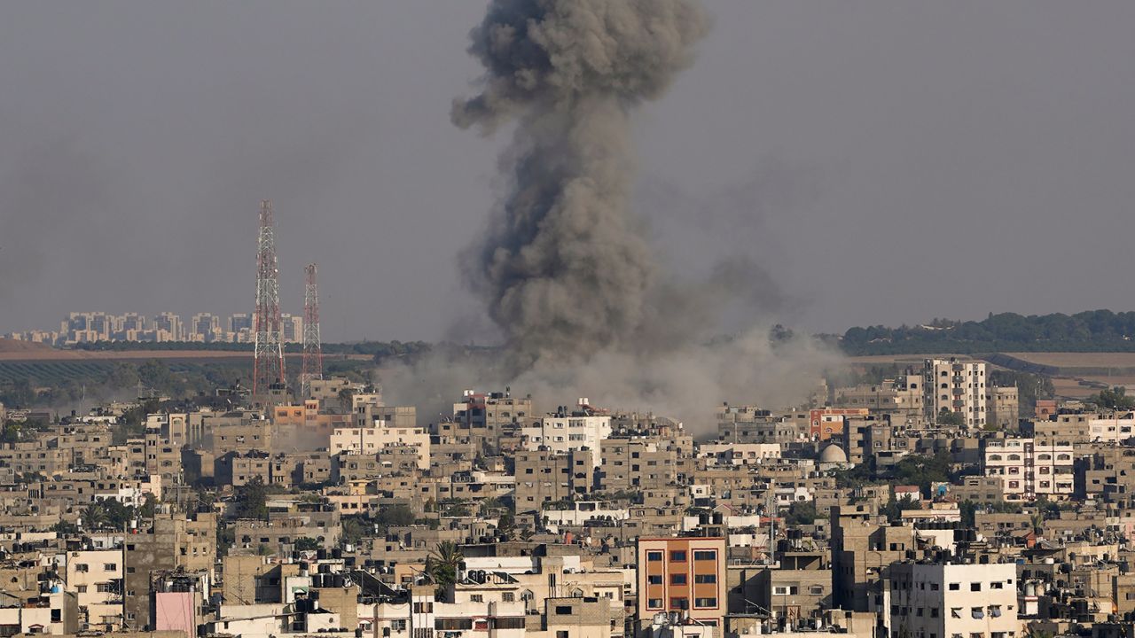 Smoke rises after an Israeli airstrike in Gaza City on Sunday.
