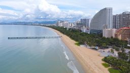 This aerial photo taken on August 6, 2022 shows an empty beach as the area is closed off and restricted due to an outbreak of the Covid-19 coronavirus in Hainan, in China's southern Hainan province. - China OUT (Photo by CNS / AFP) / China OUT (Photo by -/CNS/AFP via Getty Images)