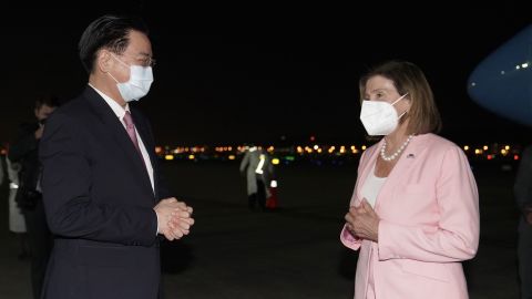 US House Speaker Nancy Pelosi is welcomed by Taiwanese Foreign Minister Joseph Wu after landing at Taipei Songshan Airport on August 2.