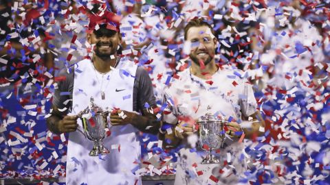 Kyrgios and Sock celebrate winning the doubles title at the Citi Open.