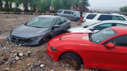 Cars stuck in the mud and debris following the flash flooding over the weekend in Death Valley