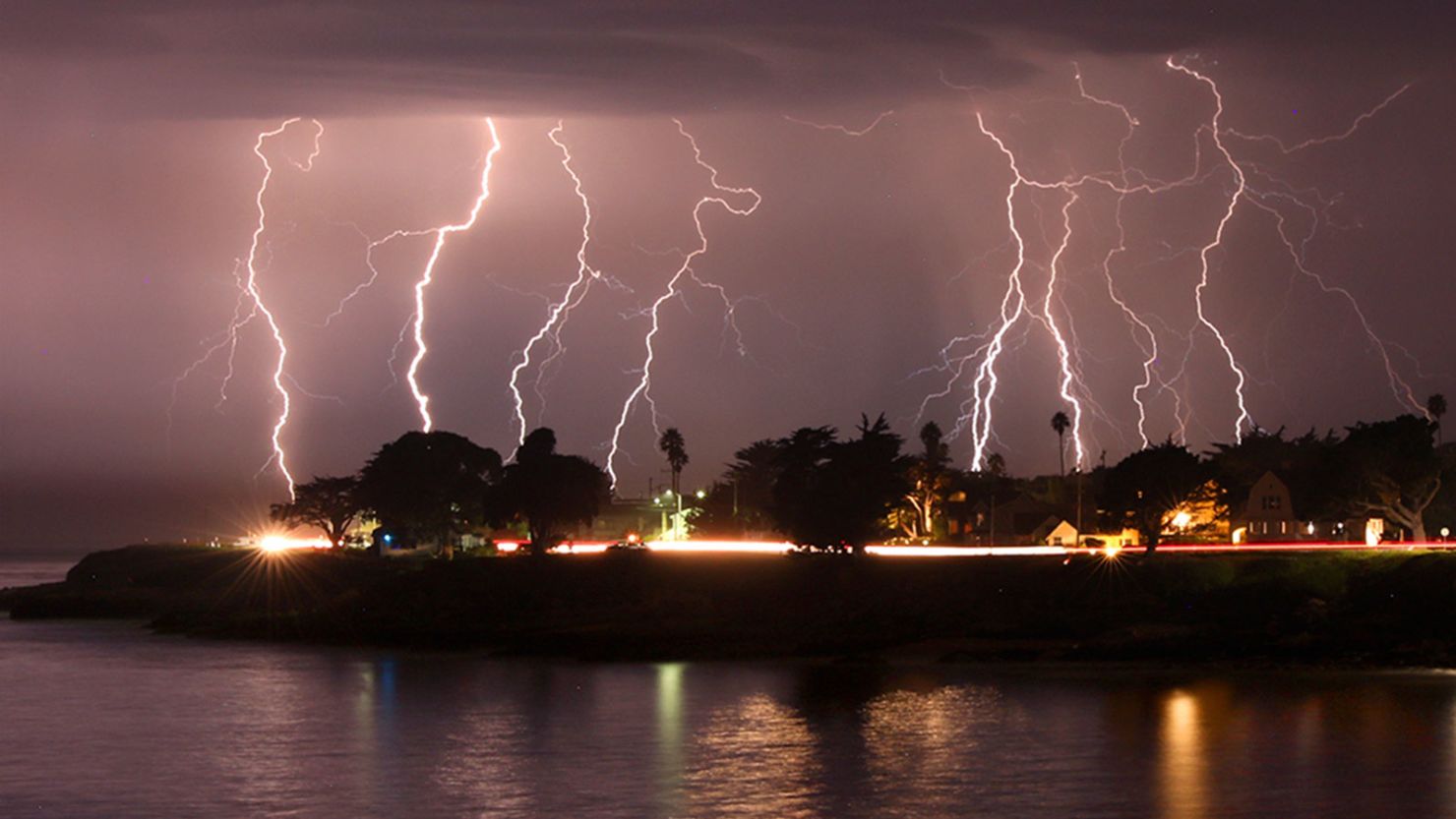 The lightning storm seen here, crackling over Mitchell's Cover in Santa Cruz, California, was one of many that rolled through the state in August 2020, sparking dozens of wildfires.