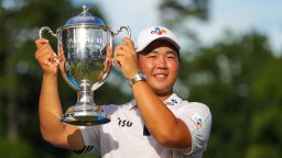 Joohyung Kim holds the Wyndham Championship Trophy after winning the Wyndham Championship PGA Tournament on August 7, 2022, at Sedgefield Country Club in Greensboro, NC. 