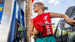 A customer pumps gas at an Exxon gas station on July 29, 2022 in Houston, Texas. 