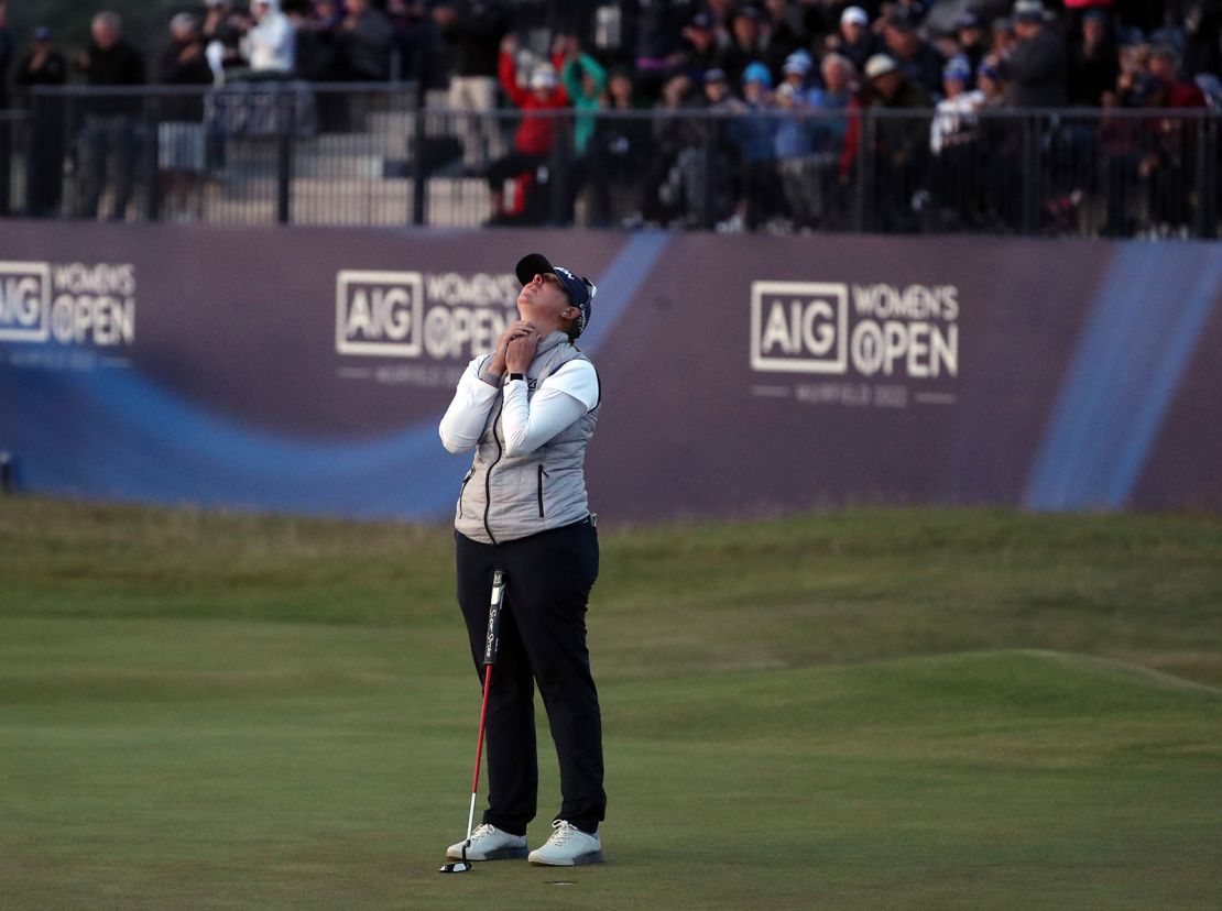 Buhai reacts after sinking the winning putt.