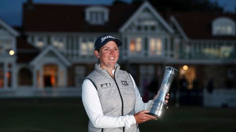 South Africa's Ashleigh Buhai poses with the trophy after winning the Women's British Open in Muirfield, Scotland.