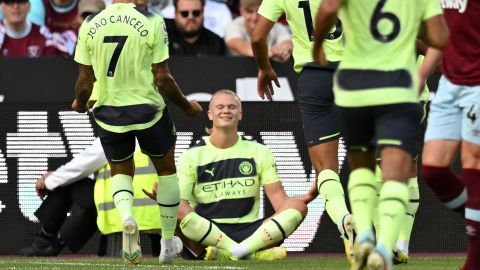 Haaland celebrates after scoring the opening goal from the penalty spot against West Ham.