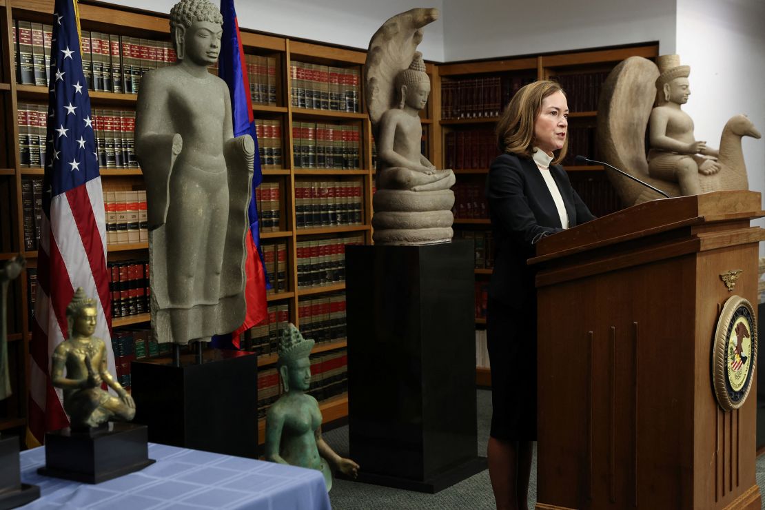 Assistant Secretary of State for Educational and Cultural Affairs, Lee Satterfield, pictured alongside some of the looted artifacts at Monday's repatriation ceremony.