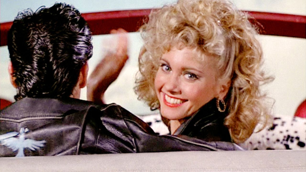 Olivia Newton-John waves goodbye in the 1978 movie "Grease."